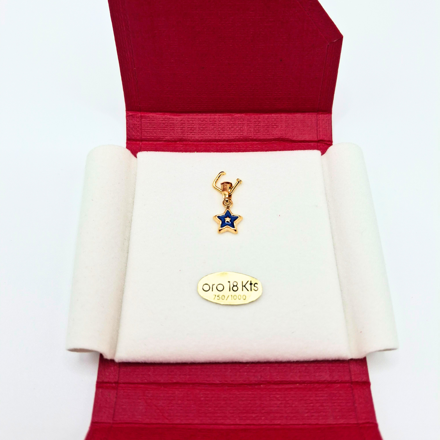 Colgante estrella pequeña azul de oro 18k