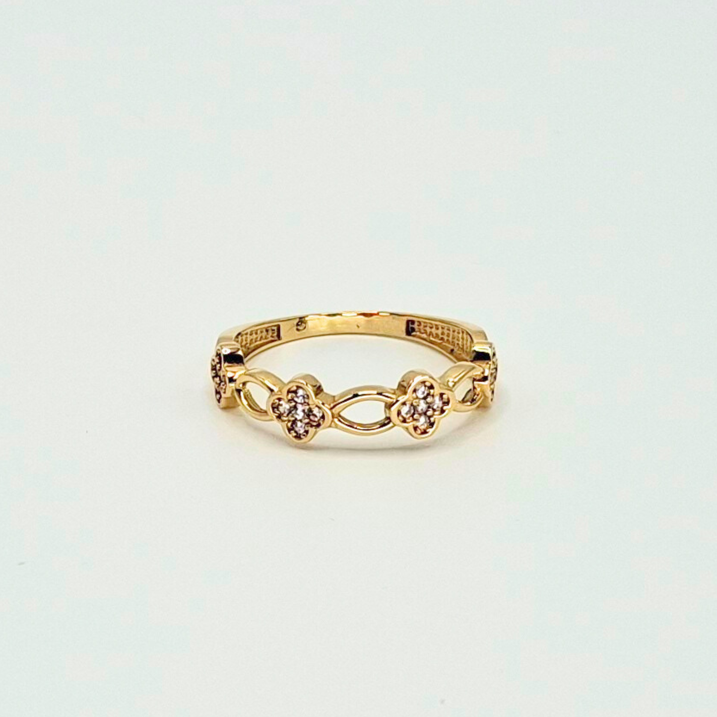 Anillo flores de circones, oro 18k