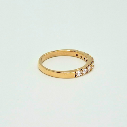 Anillo medio cintillo con circones, oro 18k