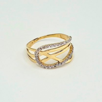 Anillo entrelazado infinito con circones, oro 18k