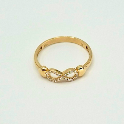 Anillo infinito con circones y corazones, oro 18k