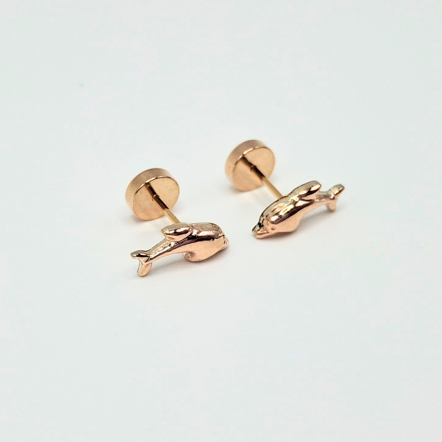 Aros abridores para bebé  y niña de oro laminado de 20k modelo delfín.