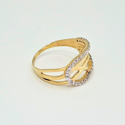 Anillo entrelazado infinito con circones, oro 18k