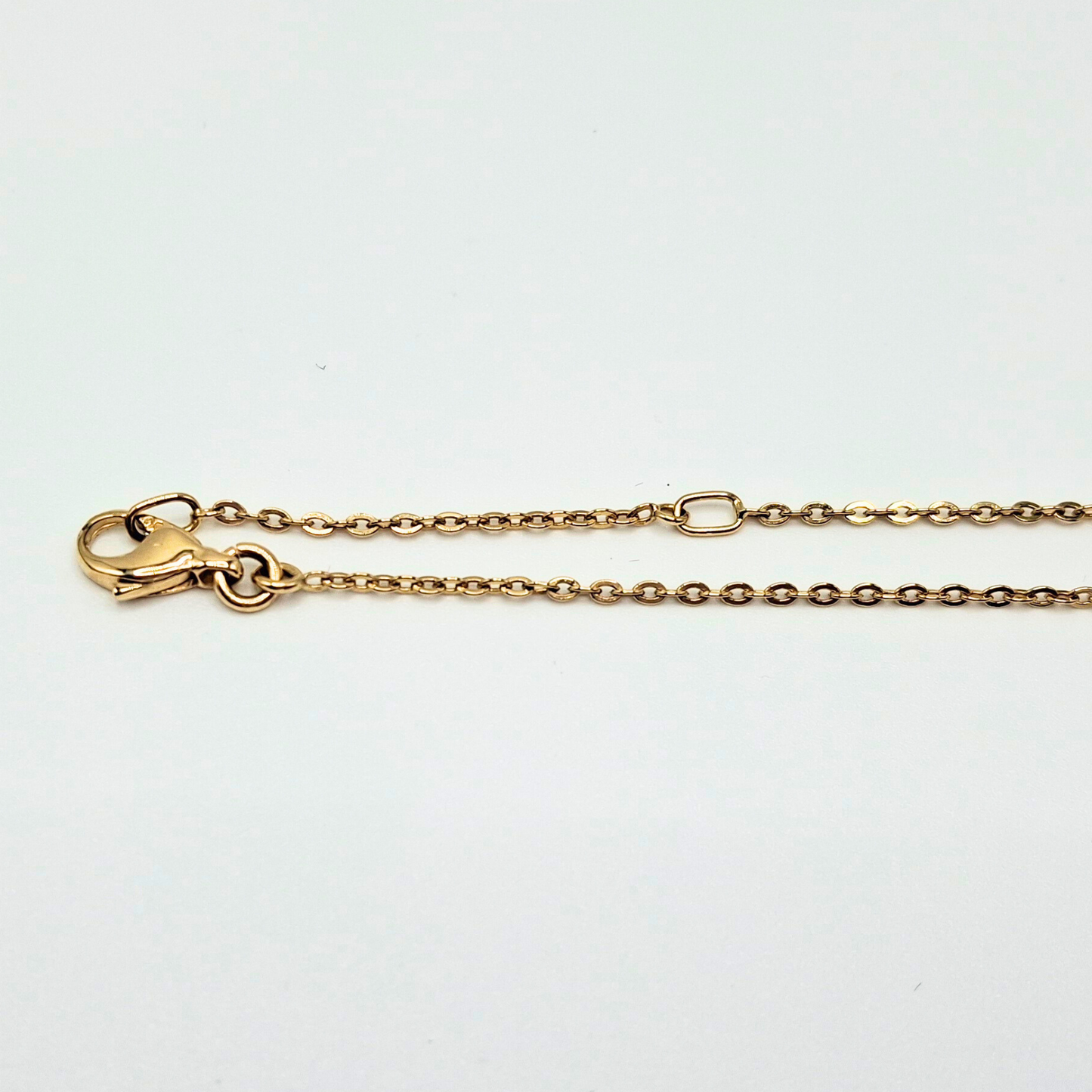 Collar modelo piedra engastada colores 18k, cadena forzatina 45 cm y 40 cm